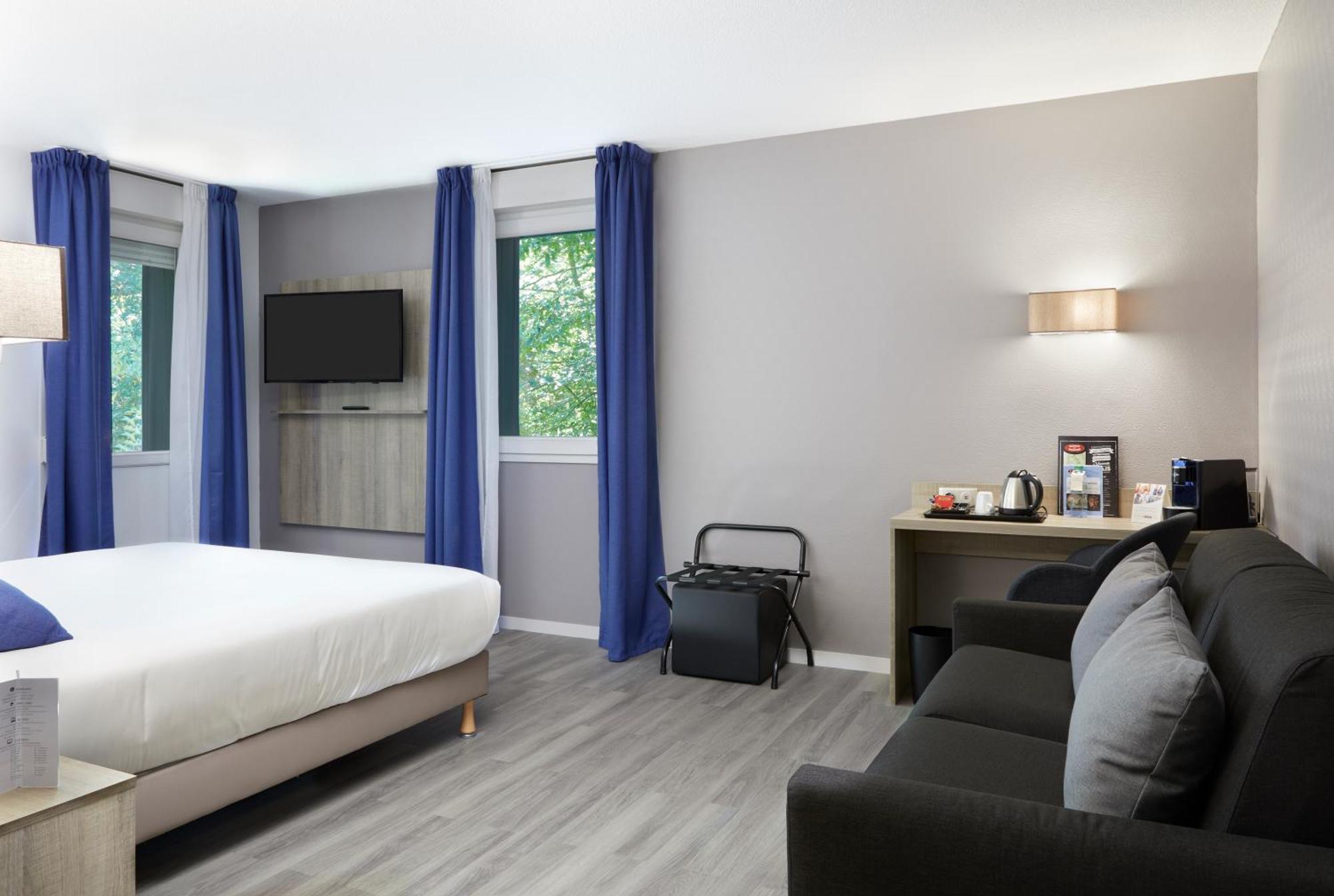 Hotel Le Circuit Le Mans Eksteriør billede